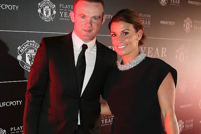 Wayne Rooney with his wife Coleen Rooney (Photo by Matthew Peters/Manchester United via Getty Images)
