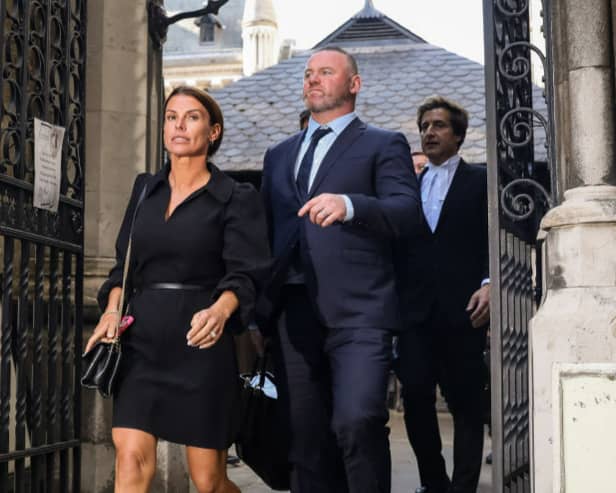  Coleen Rooney and Wayne Rooney leave the Royal Courts of Justice, Strand on May 17, 2022 in London, England. (Photo by Tristan Fewings/Getty Images)