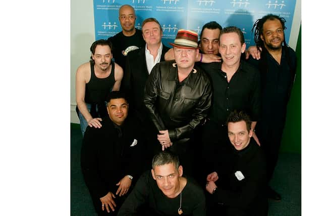 UB40 pose backstage prior to their performance at the final night of 5 charity gigs in aid of the Teenage Cancer Trust, which ran from April 4 to April 8, at the Royal Albert Hall on April 8, 2005 in London. (Photo by Jo Hale/Getty Images)