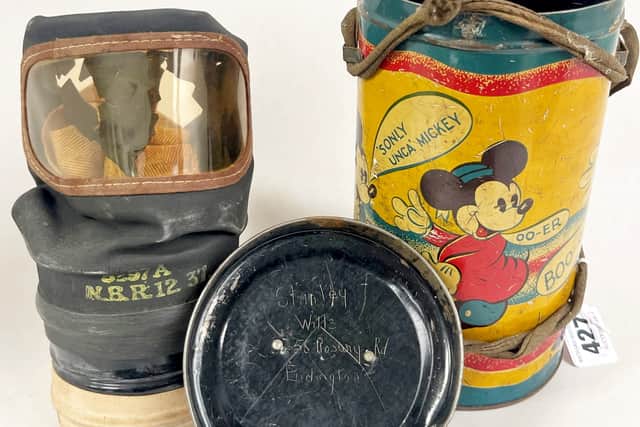 WW2 Mickey Mouse tinplate gas mask case