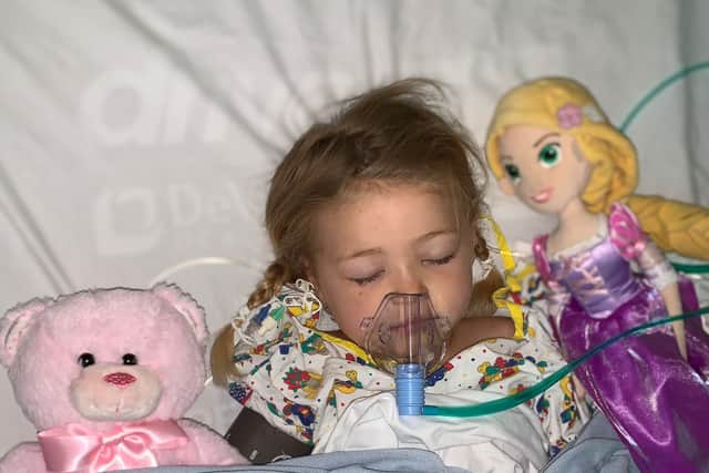 Reign Passey who almost died after catching chickenpox being treated in Birmingham Children's Hospital