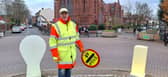 Kings Heath lollipop man Mark Swain is kept busy by the number of cars and the hundreds of children walking to school. Credit: LDRS