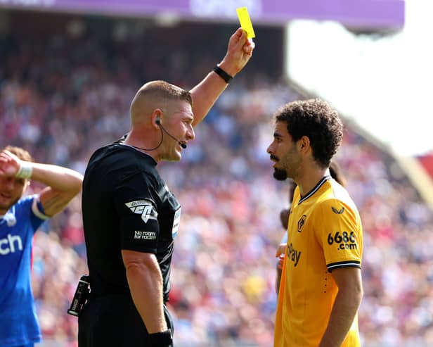 Rayan Ait-Nouri of Wolverhampton Wanderers is shown a yellow card during the Premier League match between Crystal Palace and Wolves. (Image: Getty Images)