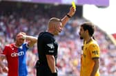 Rayan Ait-Nouri of Wolverhampton Wanderers is shown a yellow card during the Premier League match between Crystal Palace and Wolves. (Image: Getty Images)