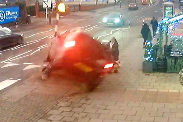 Mum & toddler cheat death as a car flips onto a pavement in Solihull