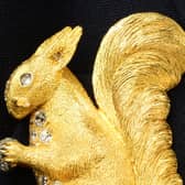A gold and diamond squirrel brooch sells for over the odds at Fellows Auctions in Birmingham