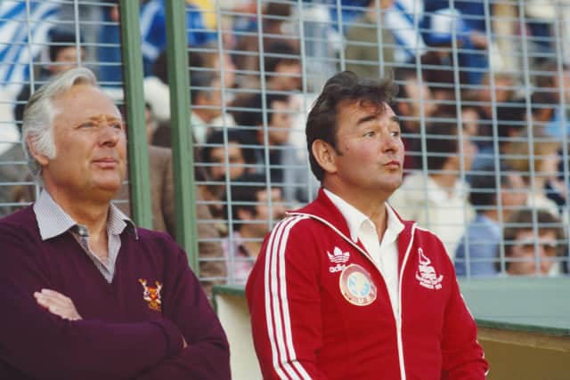 Nottingham Forest manager Brian Clough (R) and assistant Peter Taylor look on before the 1980 European Cup Final between Hamburg SV and Nottingham Forest at Santiago Bernab