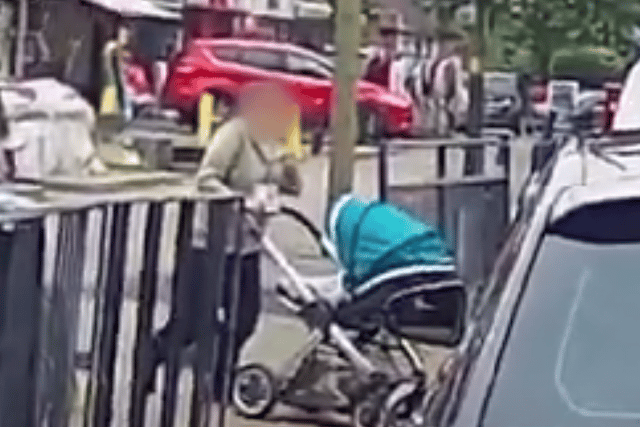 Footage hows the driver narrowly missing a woman pushing a buggy over a zebra crossing