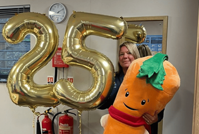 Kerry Partridge celebrates 25 years of working for Aldi supermarkets in Birmingham