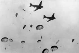 Parachutes fill the sky in World War II operation