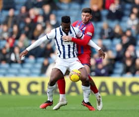 Daryl Dike was helped off in West Brom's 2-2 draw with Ipswich Town. The Baggies are awaiting the full extent of his Achilles injury. (Image: Getty Images)
