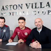 Morgan Rogers signs his Aston Villa contract in the company of Unai Emery and Monchi.