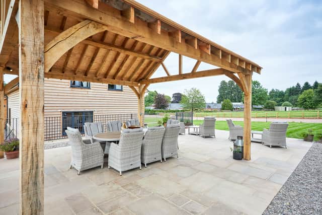 The Barn outdoor terrace at Puddleston Court in Herefordshire
