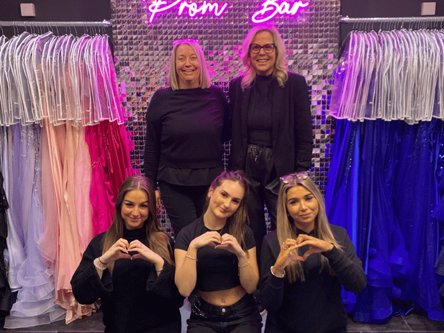 The team at the Bridal and Prom Bar shop in Solihull  including owner Lisa Groutage - top right