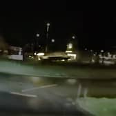 Shocking moment speeding car flips over a roundabout near Asda in Birmingham before crashing into another vehicle