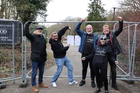 Campaigners for The Crooked House pub in Himley, near Dudley celebrate the rebuild orer at the ruins of the demolished pub