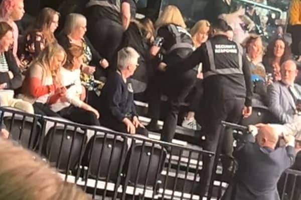 Dramatic video shows protestors being tackled by security during a Crufts protest by Peta.