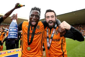 WOLVERHAMPTON, ENGLAND - MAY 03:  Nouha Dicko and Jack Price celebrate after the Sky Bet League One match between Wolverhampton Wanderers and Carlisle United at Molineux on May 3, 2014 in Wolverhampton, England.  (Photo by Scott Heavey/Getty Images)