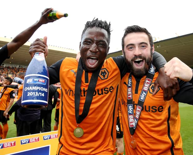 WOLVERHAMPTON, ENGLAND - MAY 03:  Nouha Dicko and Jack Price celebrate after the Sky Bet League One match between Wolverhampton Wanderers and Carlisle United at Molineux on May 3, 2014 in Wolverhampton, England.  (Photo by Scott Heavey/Getty Images)