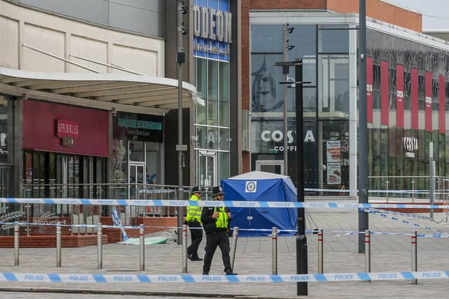 Police presence at New Square in West Bromwich, April 8, 2024 following a 15-year-old boy who was fatally stabbed yesterday evening (April 7)
