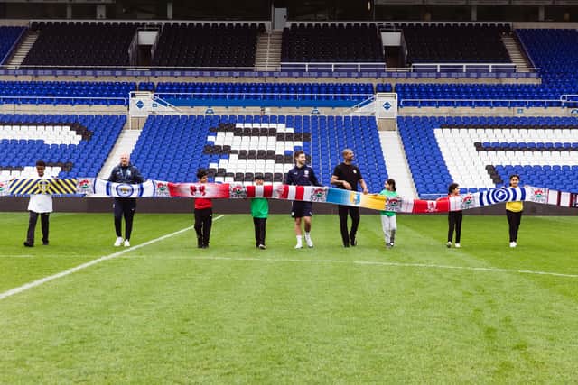World's longest football scarp presented by Birmingham school children at St Andrews stadium @ Knighthead Park