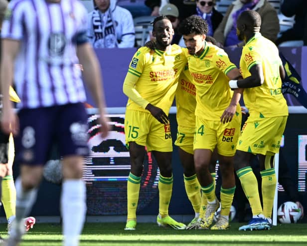 Nathan Zeze (C) is wanted by Aston Villa as well as two other European clubs. Nantes have made their mind up on his future. (Photo by LIONEL BONAVENTURE/AFP via Getty Images)