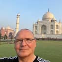 Ian Molland, 55, at the Taj Mahal in India before he got stranded due to Dubai floods