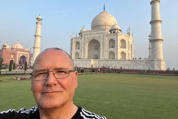 Ian Molland, 55, at the Taj Mahal in India before he got stranded due to Dubai floods