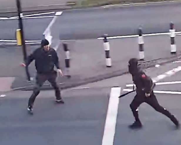 Kelvin Ward, 50, being attacked where he was stabbed to death on Chester Road in Castle Bromwich, Birmingham, on April 18, 2023
