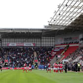 The players were taken off the pitch as medics attended to a fan in stands at the New York Stadium