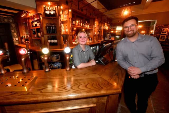 Inside the new bar area at Himley House with staff members Kaitlyn Stainer and Ash Knight