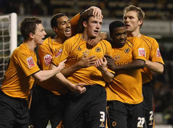 Neill Collins of Wolves is congratulated by teammates after scoring their team's second goal during the Coca-Cola Championship match between Wolverhampton Wanderers and Scunthorpe United at Molineux Stadium on March 18, 2008 in Wolverhampton, England.  (Photo by Laurence Griffiths/Getty Images)