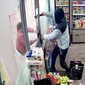 CCTV from the TAAS express shop in Bearwood Road, Smethwick