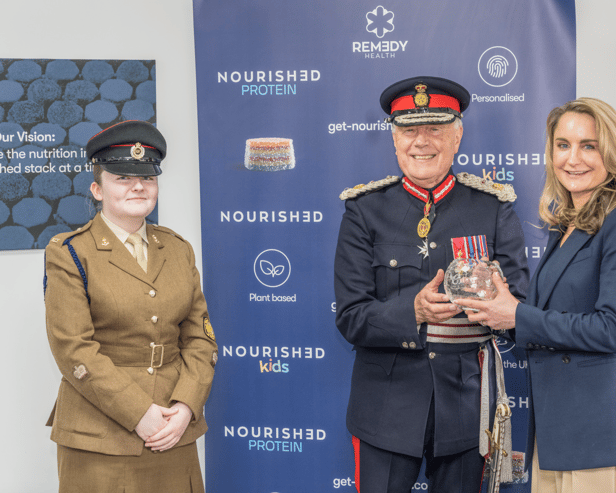 Rem3dy Health receives Kings Award for Enterprise - Melissa receives the award from Lord Lieutenant John Crabtree OBE 