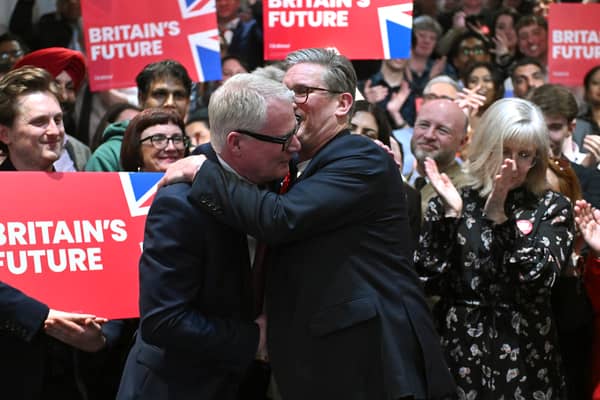 Labour candidate for West Midlands Mayor Richard Parker celebrates his victory with Labour leader Sir Keir Starmer following the declaration for West Midlands Mayor 