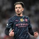 Jack Grealish of Manchester City looks on during the UEFA Champions League quarter-final first leg match between Real Madrid CF and Manchester City at Estadio Santiago Bernabeu on April 09, 2024 in Madrid