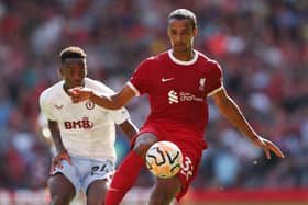 Joel Matip (R) won't play against Aston Villa for Liverpool. He suffered an ACL injury in the winter. (Photo by Matt McNulty/Getty Images)