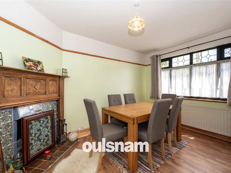 A welcoming reception hall has traditional doors leading off to both the dining room and lounge with an opening into the kitchen