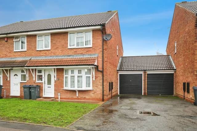 A smart semi-detached frontage with driveway parking, setting the tone for a practical and well-sized family home