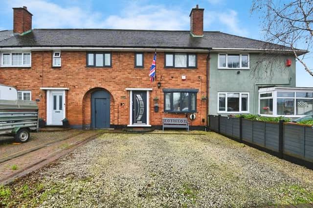 A tidy mid-terrace home set back from the road with the added benefit of off-road parking