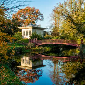 Chinese House on the River Sow in autumn at Shugborough Estate