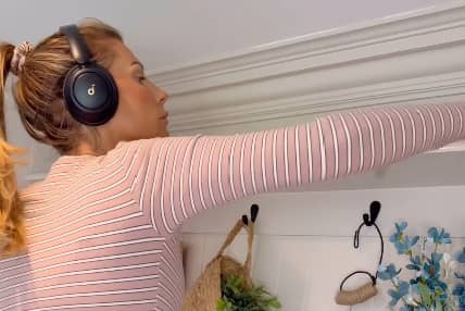 Mrs Hinch uses the soundcore Q30 by Anker Hybrid Active Noise Cancelling Headphones while she does the housework to keep her motivated.