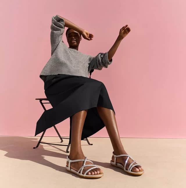 The FitFlop Gracie Crystal Strappy Back-Strap Sandals became my go-to holiday shoes thanks to their comfort and stylish design. Photo posed by model.