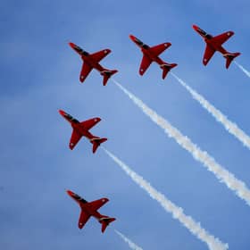 The Red Arrows go through one of their aerobatic displays at RAF Scampton on 12 November 12 2009.