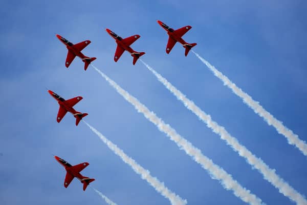 The Red Arrows go through one of their aerobatic displays at RAF Scampton on 12 November 12 2009.