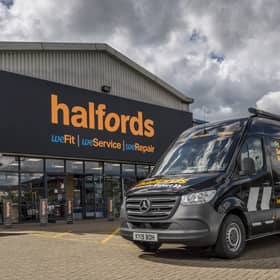 A Halfords store and van