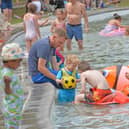  Crowds flock to Tettenhall Pool to cool down in the summer sun.