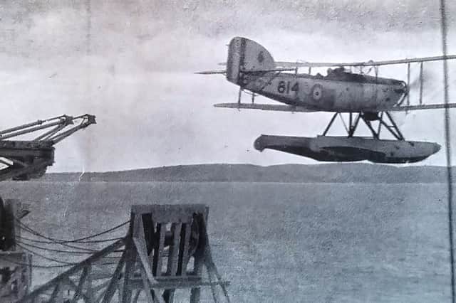 Aircraft being catapulted off HMS Shropshire in 1934