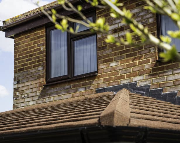 A modern home extension featuring double-glazed window installations and roofline improvements by Reliant Windows.