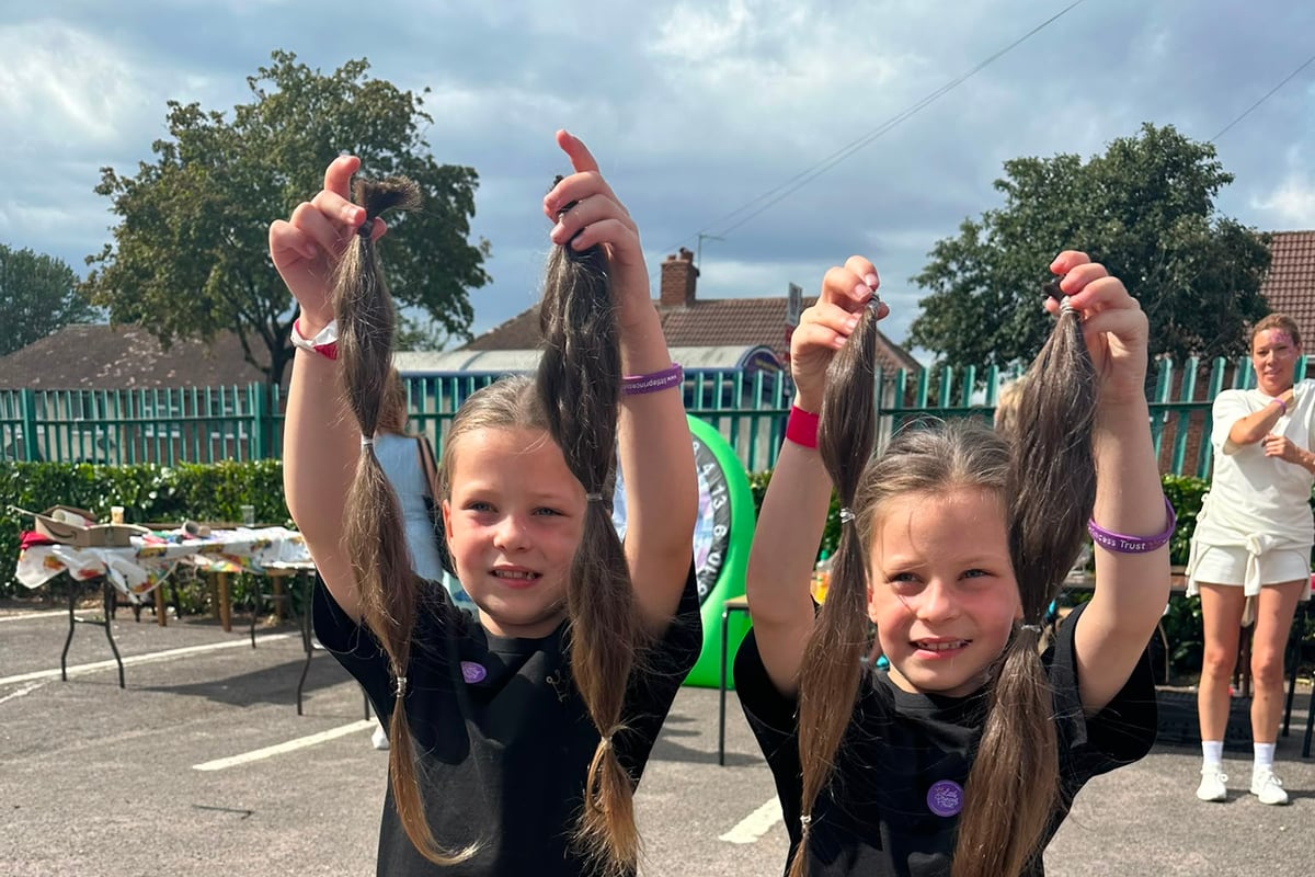 Seven-Year-Old Twins Raise Over £4,000 With First Haircuts For Charity